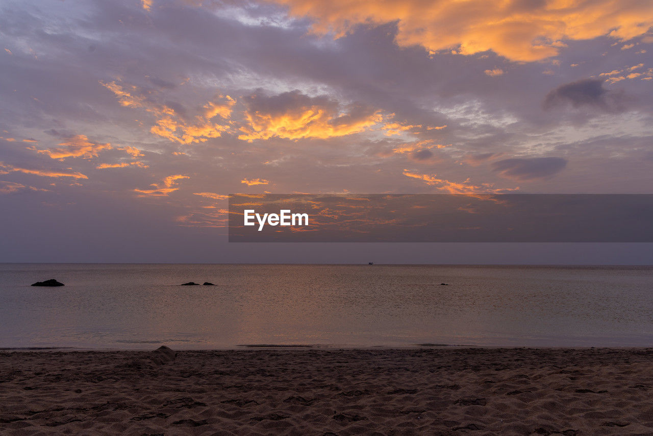 sky, water, sea, sunset, cloud, land, beach, scenics - nature, beauty in nature, nature, tranquility, horizon over water, horizon, tranquil scene, sand, ocean, shore, environment, body of water, seascape, coast, dramatic sky, idyllic, travel destinations, orange color, travel, no people, outdoors, sun, dawn, reflection, landscape, holiday, vacation, sunlight, trip, tourism, coastline, afterglow, non-urban scene, wave, animal, evening, cloudscape