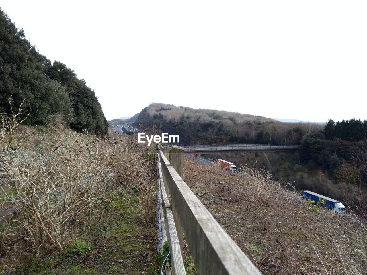 High angle view of road on landscape against clear sky