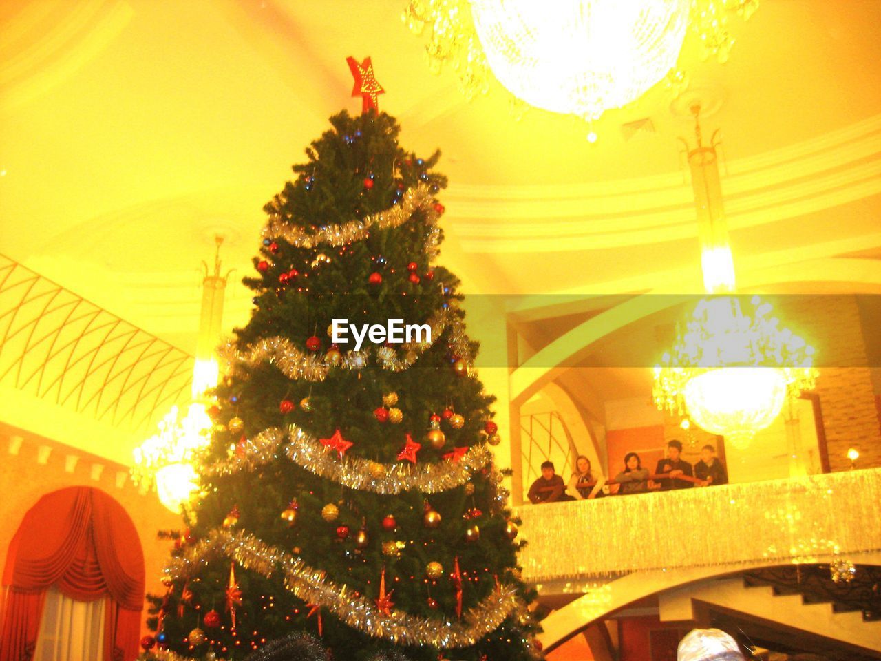 LOW ANGLE VIEW OF ILLUMINATED CHRISTMAS DECORATION