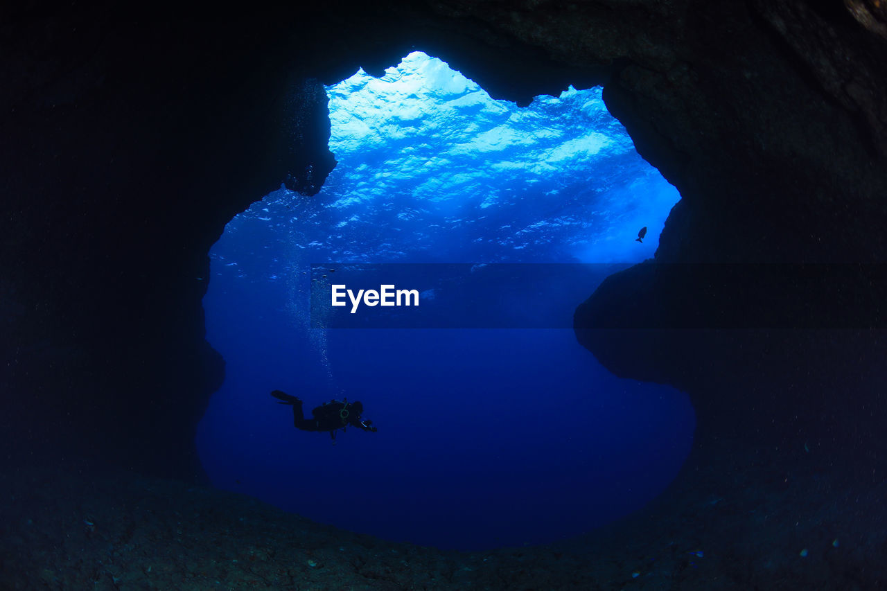 Woman swimming in sea