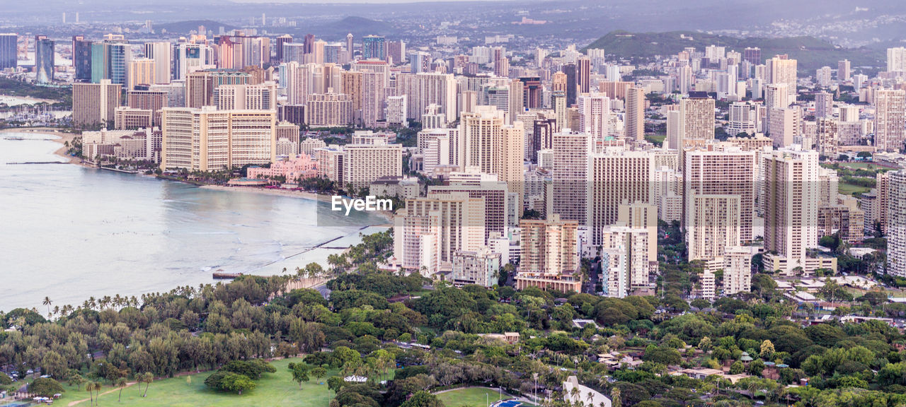 HIGH ANGLE VIEW OF CITY BUILDINGS AND BAY