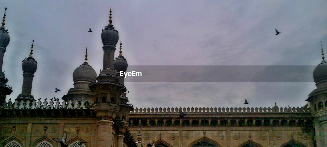 VIEW OF MOSQUE AGAINST SKY