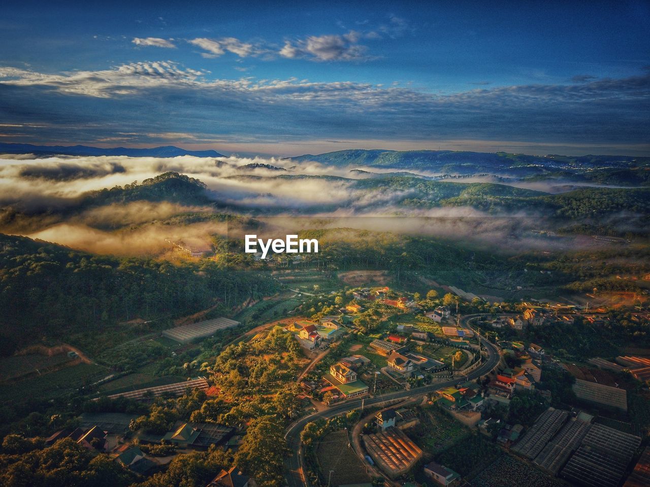 Aerial view of townscape against sky