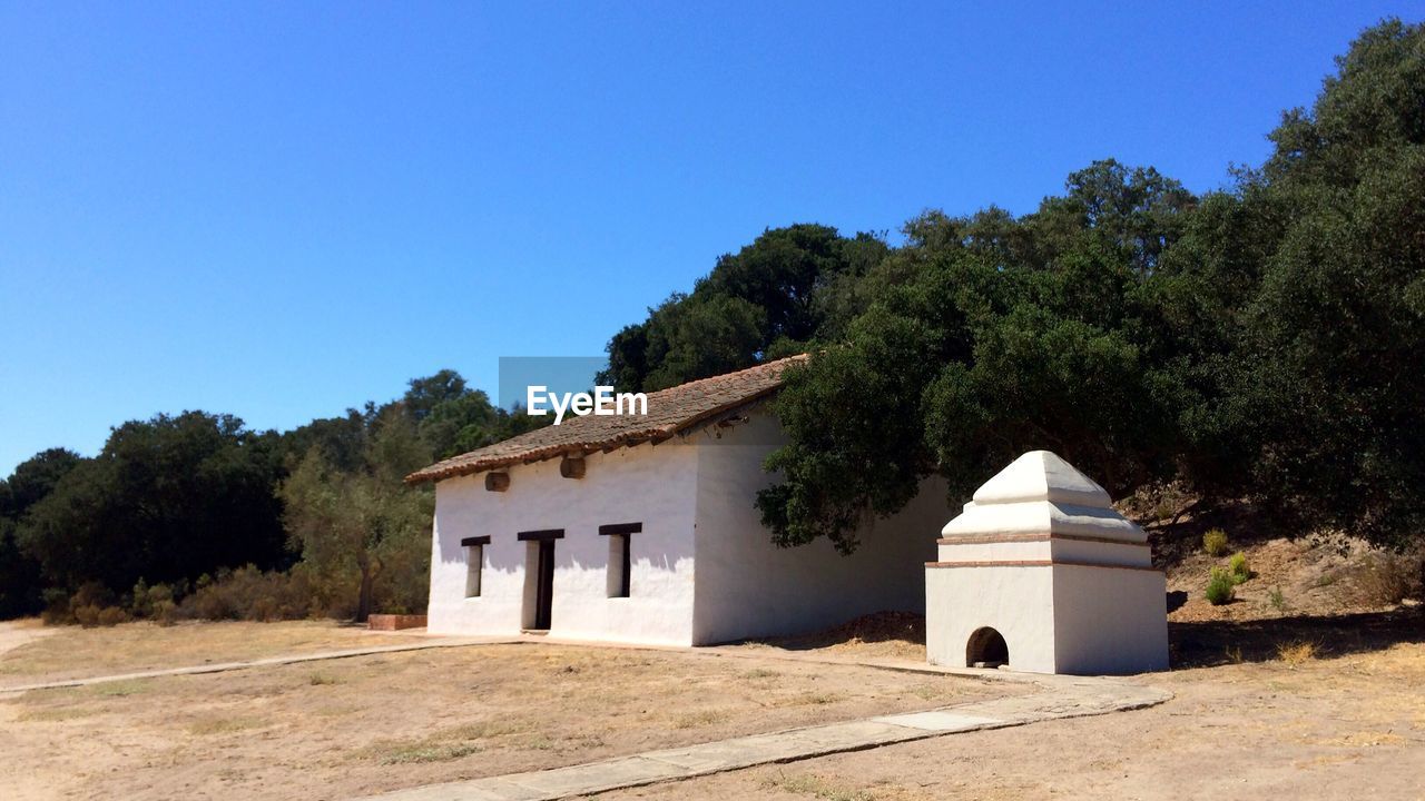 BUILT STRUCTURE AGAINST BLUE SKY