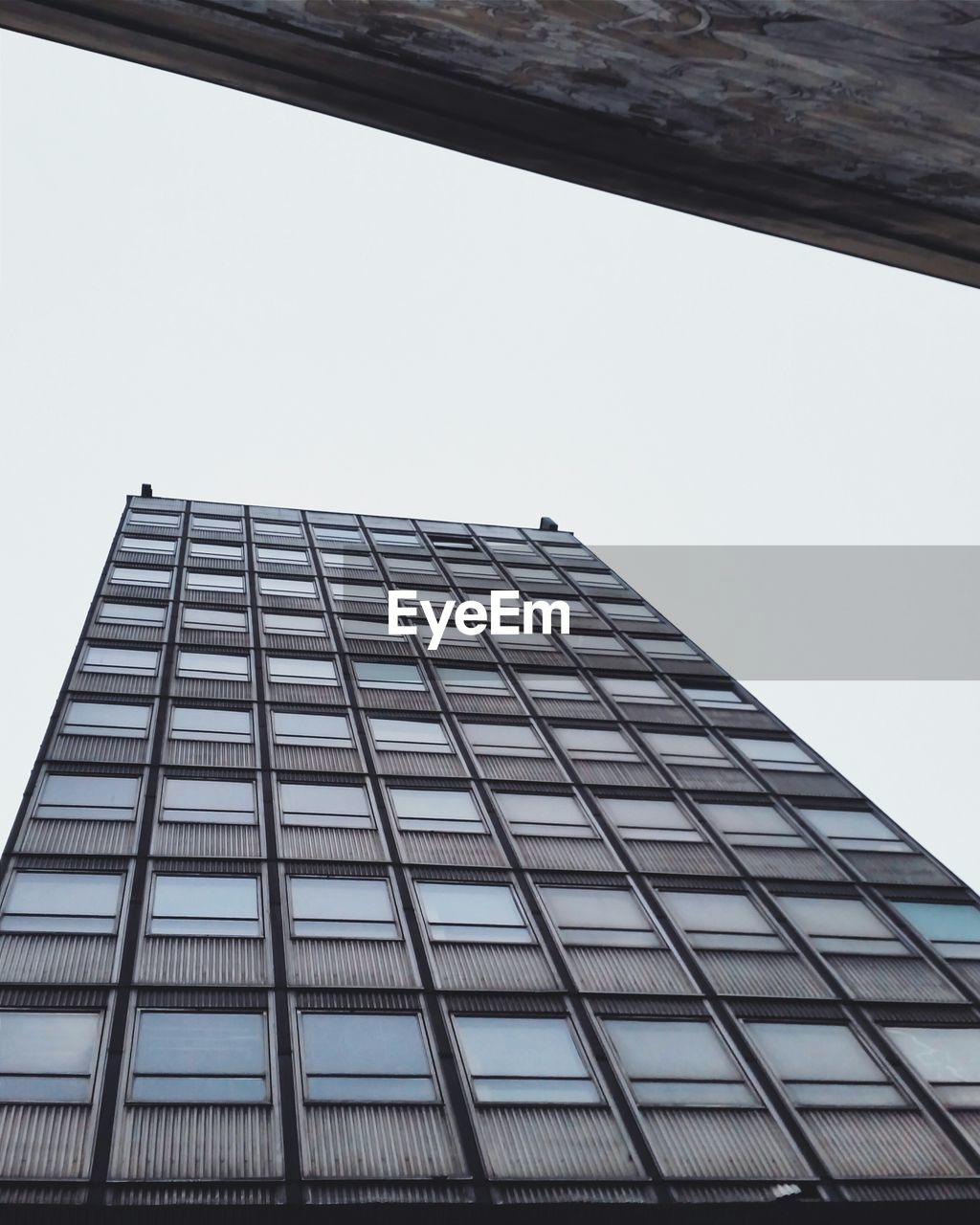 Low angle view of city building against sky