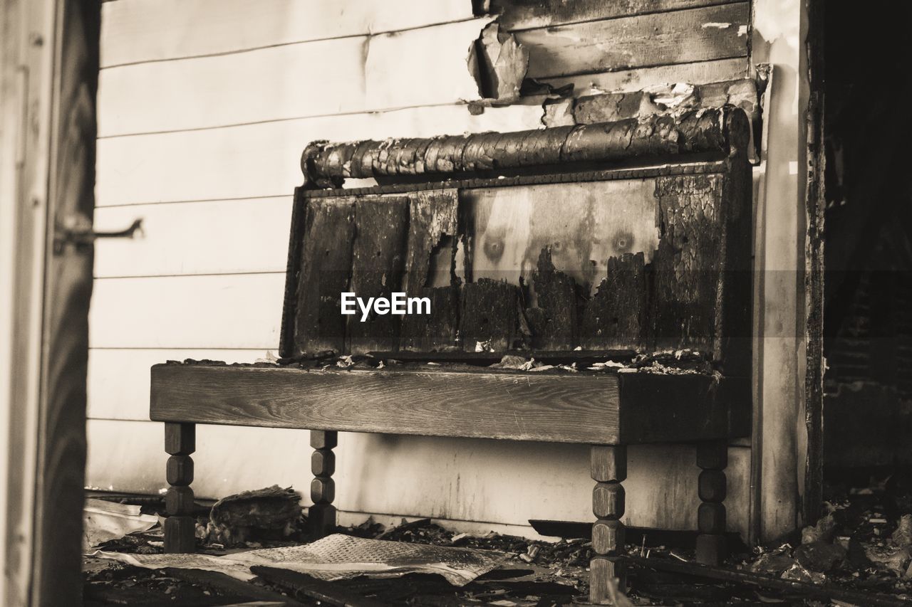 Close-up of furniture at abandoned home