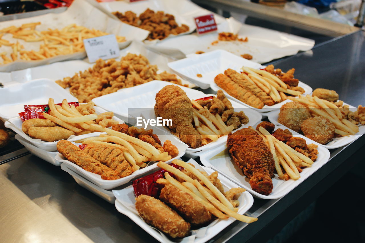Variety of fast food on table