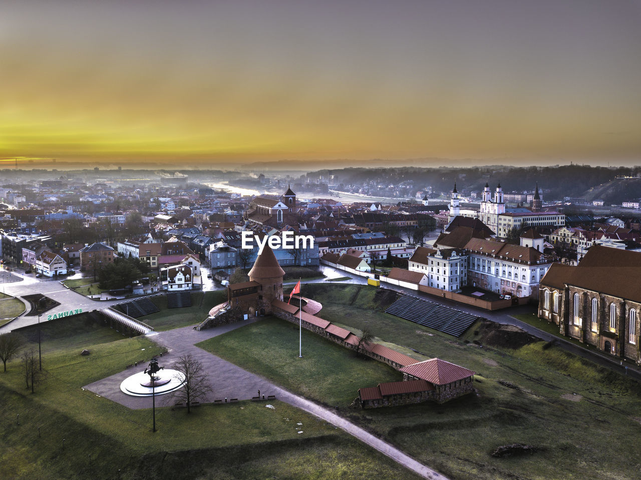 High angle view of townscape against sky during sunset