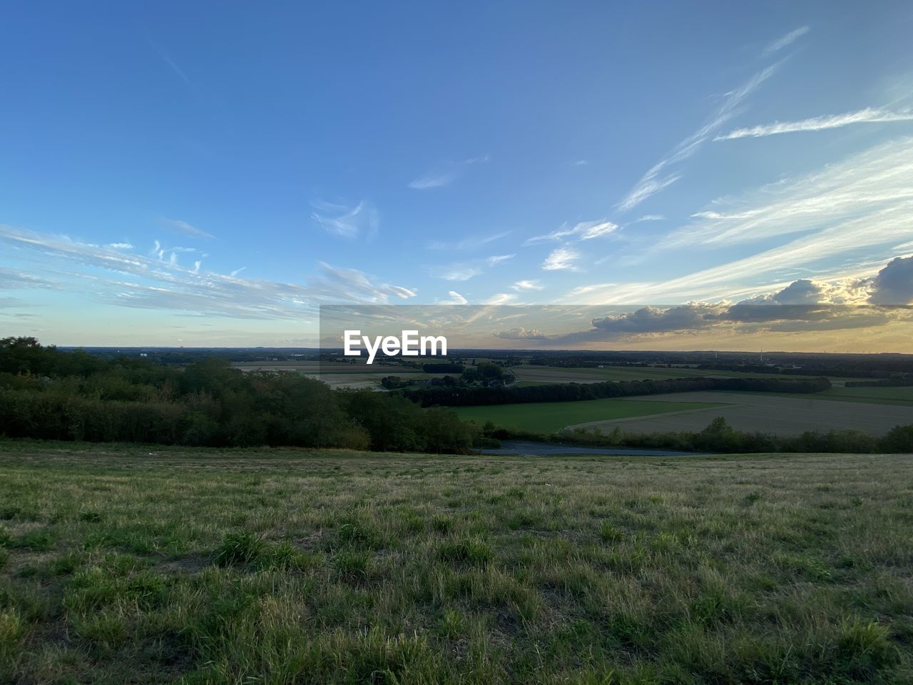 SCENIC VIEW OF LAND AGAINST SKY DURING SUNRISE