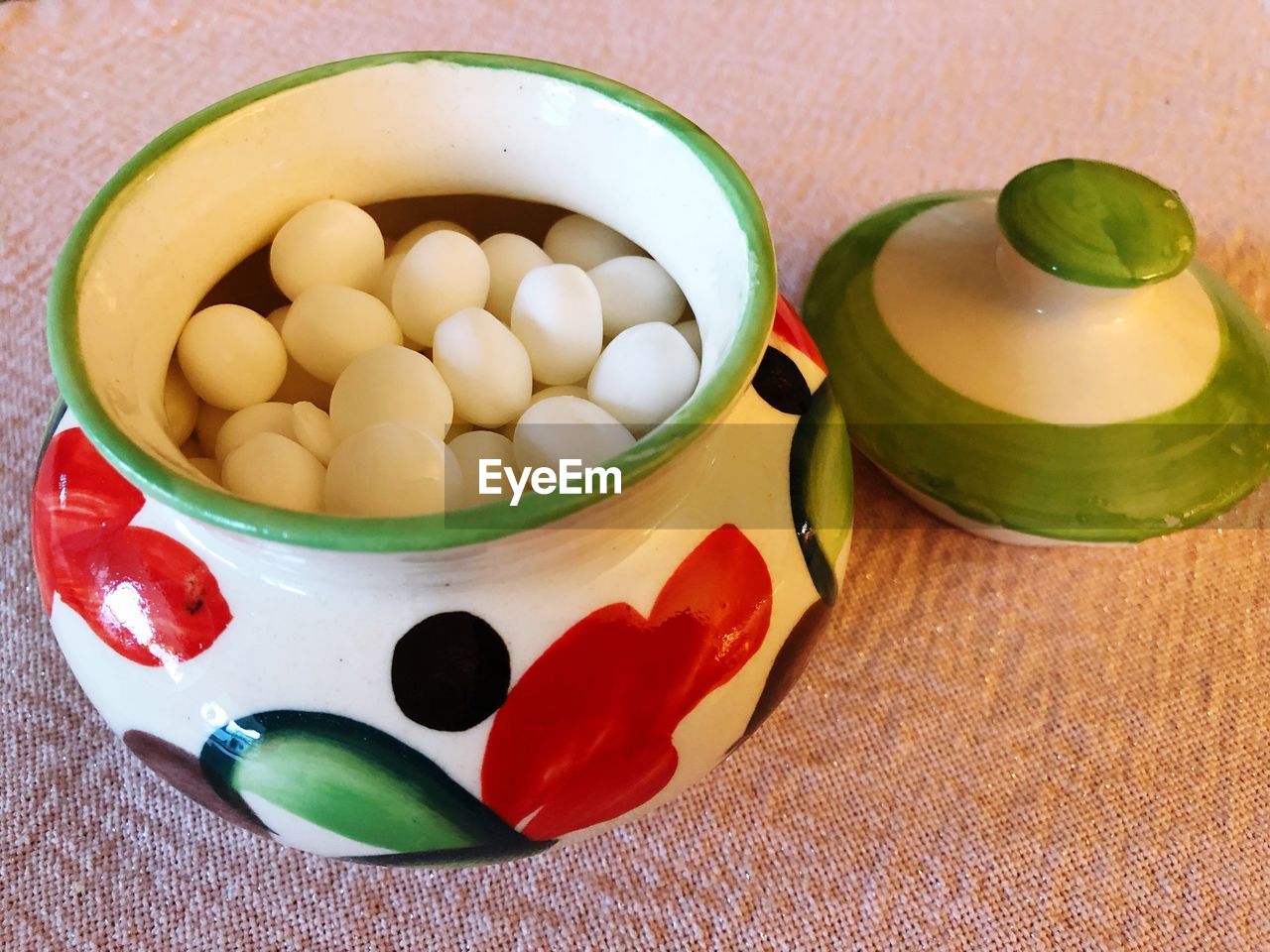 HIGH ANGLE VIEW OF CANDIES IN BOWL