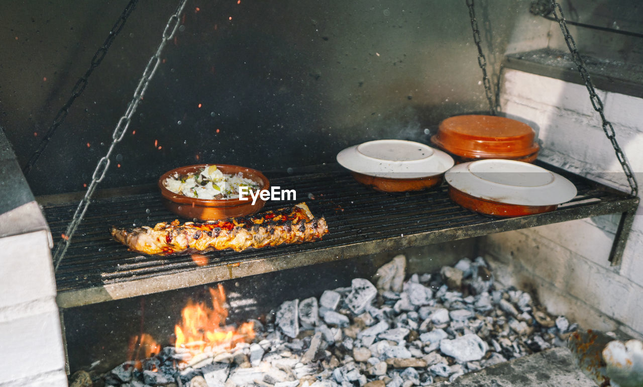 Close up shot of a mediterranean bbq barbecue grill full with fresh meat and healthy vegetarian food