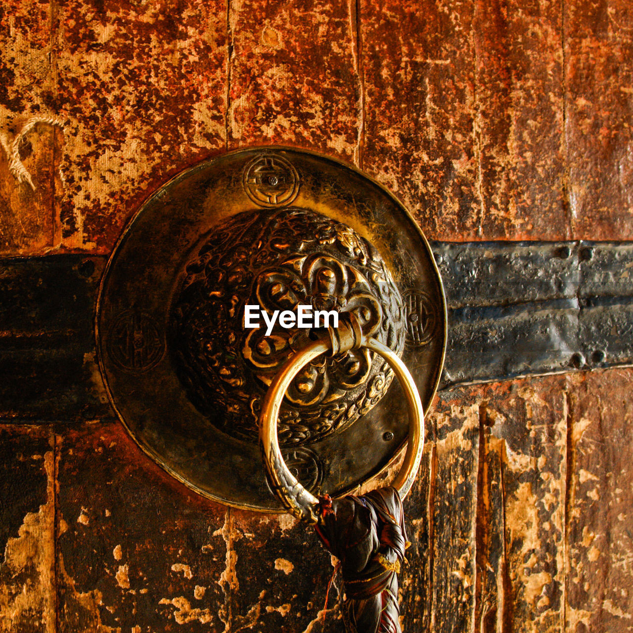 Brown wooden door with knocker