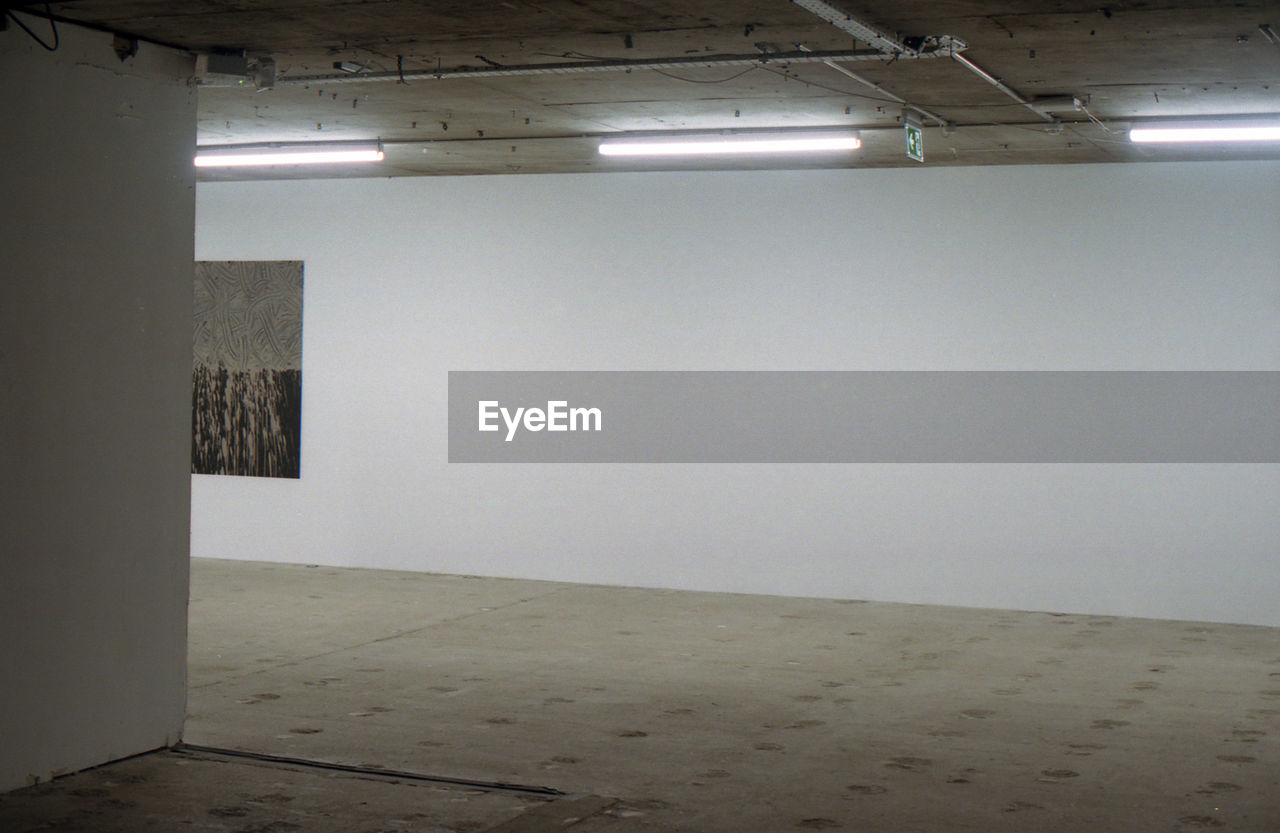 VIEW OF ILLUMINATED EMPTY ROOM