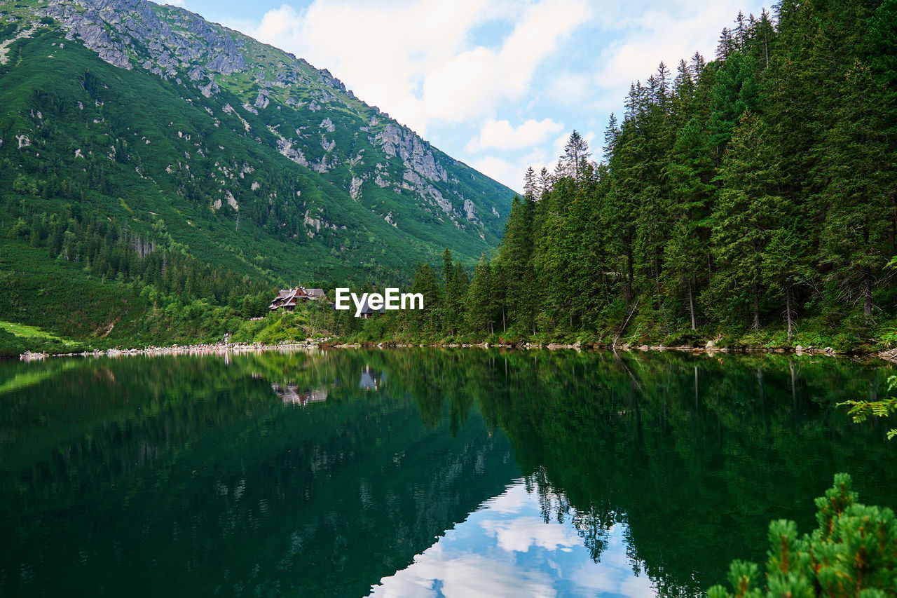 Mountains range near beautiful lake. tatra national park in poland. morskie oko or sea eye lake