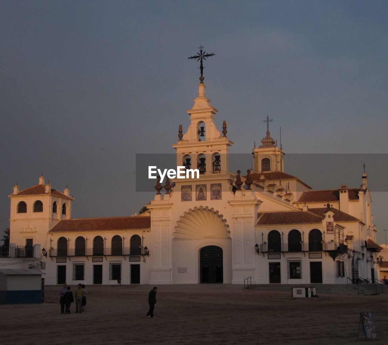 Whitewashed church at sunset