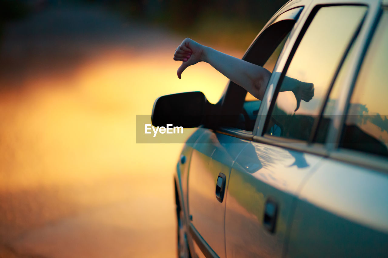 CLOSE-UP OF VINTAGE CAR ON MIRROR