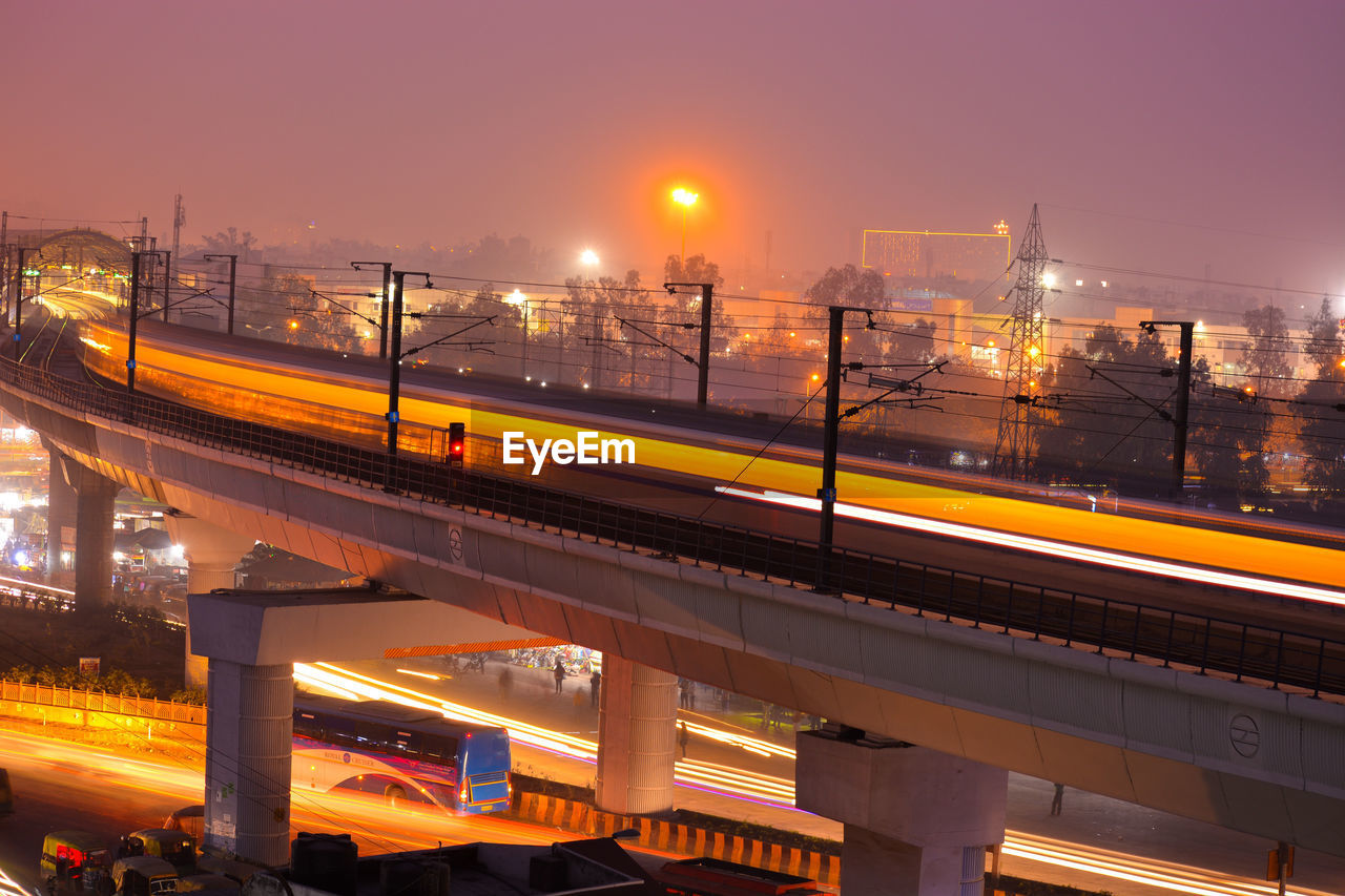 High angle view of light trails on road in city