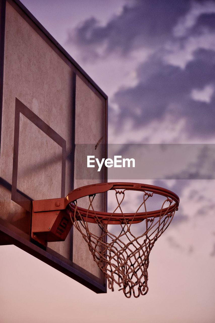 Low angle view of basketball hoop against sky