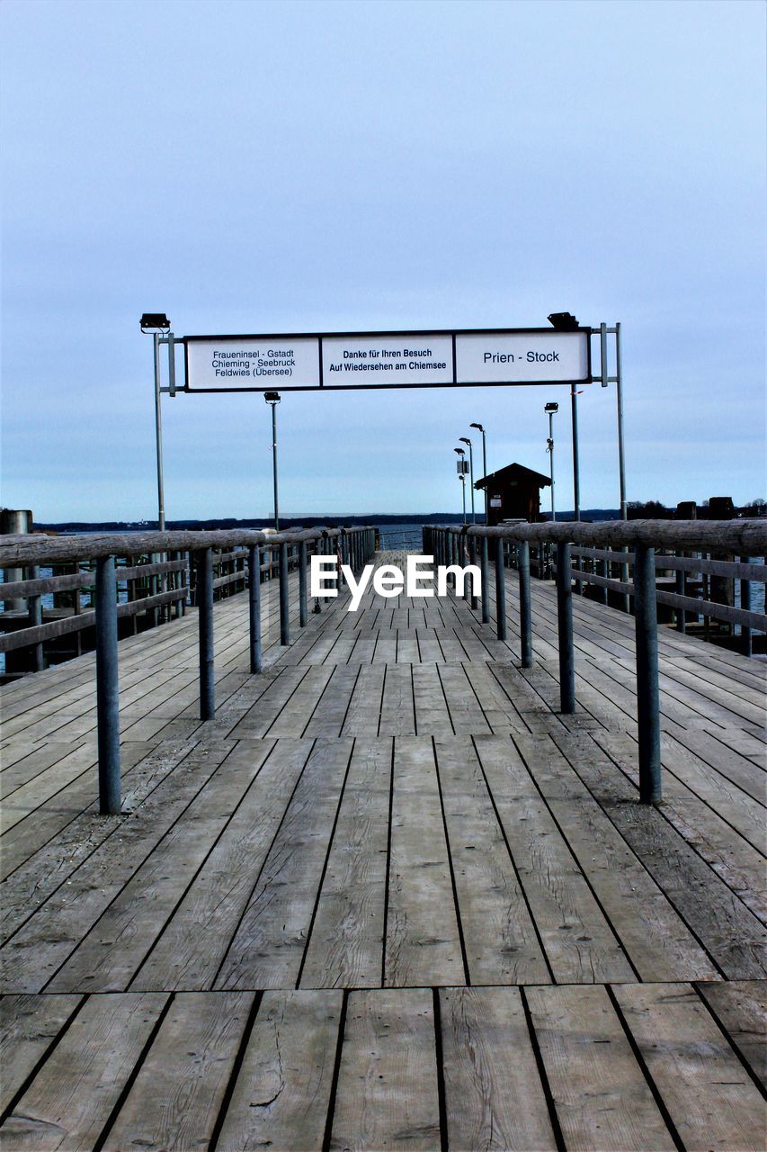 PIER BY SEA AGAINST CLEAR SKY