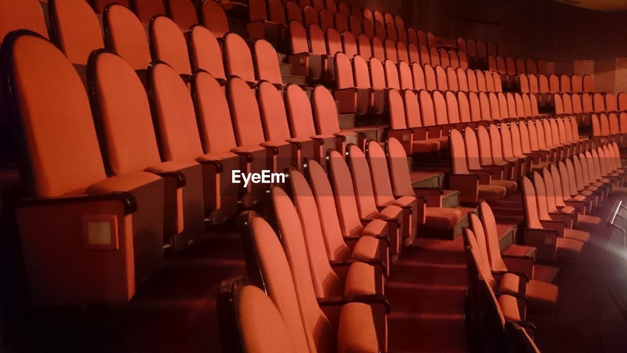 Empty chairs in theater