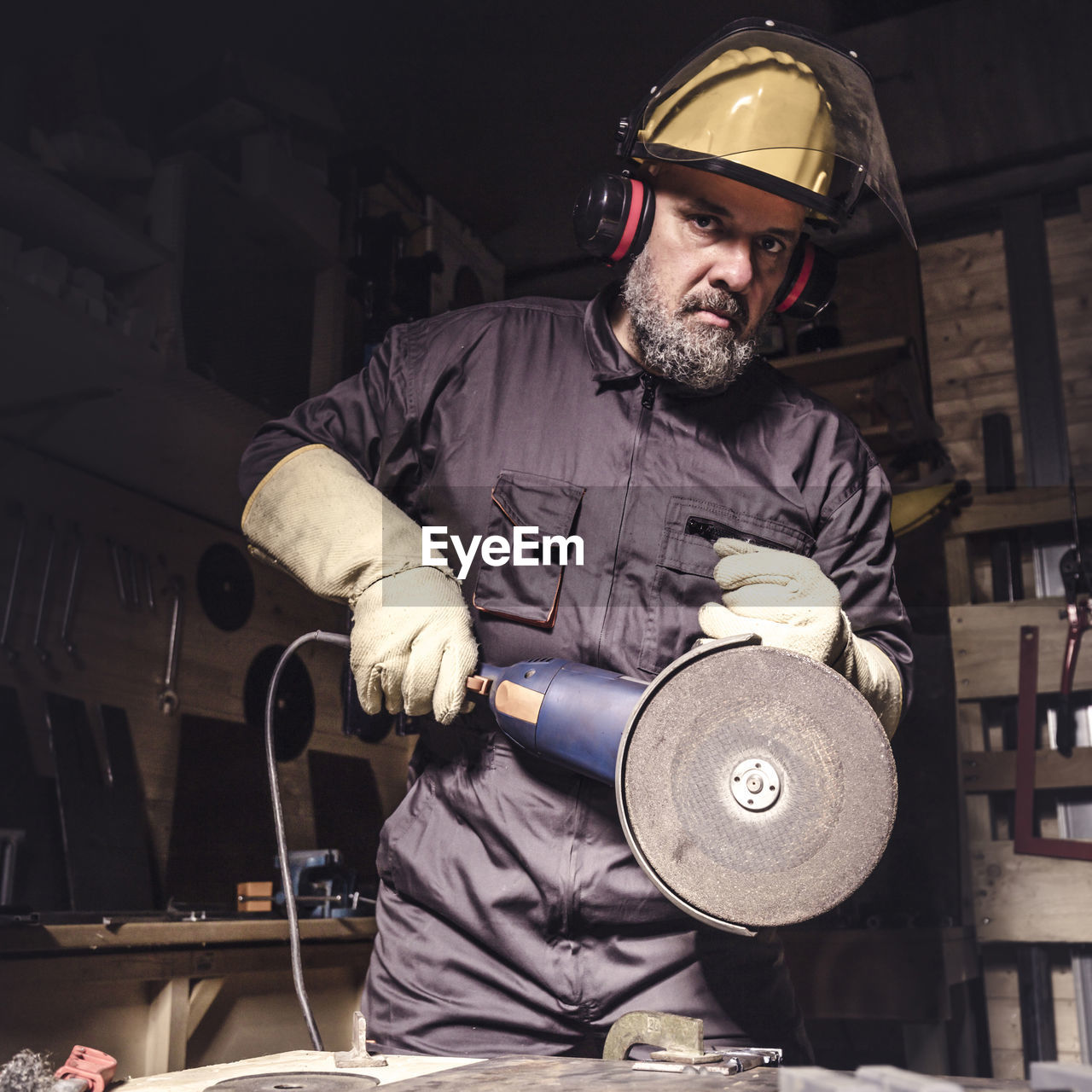 Portrait of manual worker working in workshop