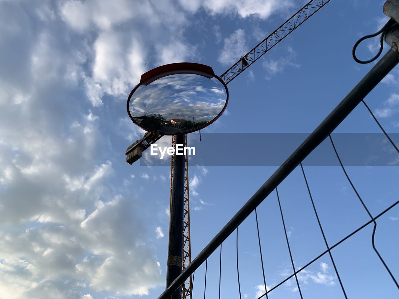 LOW ANGLE VIEW OF STREET LIGHT AGAINST BLUE SKY