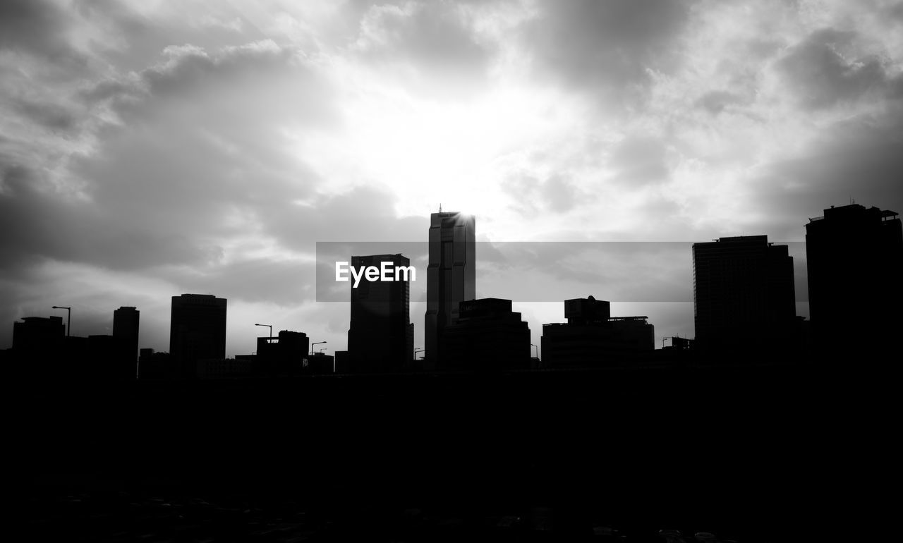 skyline, sky, city, black and white, architecture, building exterior, built structure, horizon, skyscraper, urban skyline, building, office building exterior, landscape, cityscape, cloud, darkness, monochrome photography, monochrome, black, nature, metropolis, no people, city life, residential district, dusk, silhouette, downtown district, travel destinations, daytime, outdoors, metropolitan area, dark, dramatic sky, office, tower