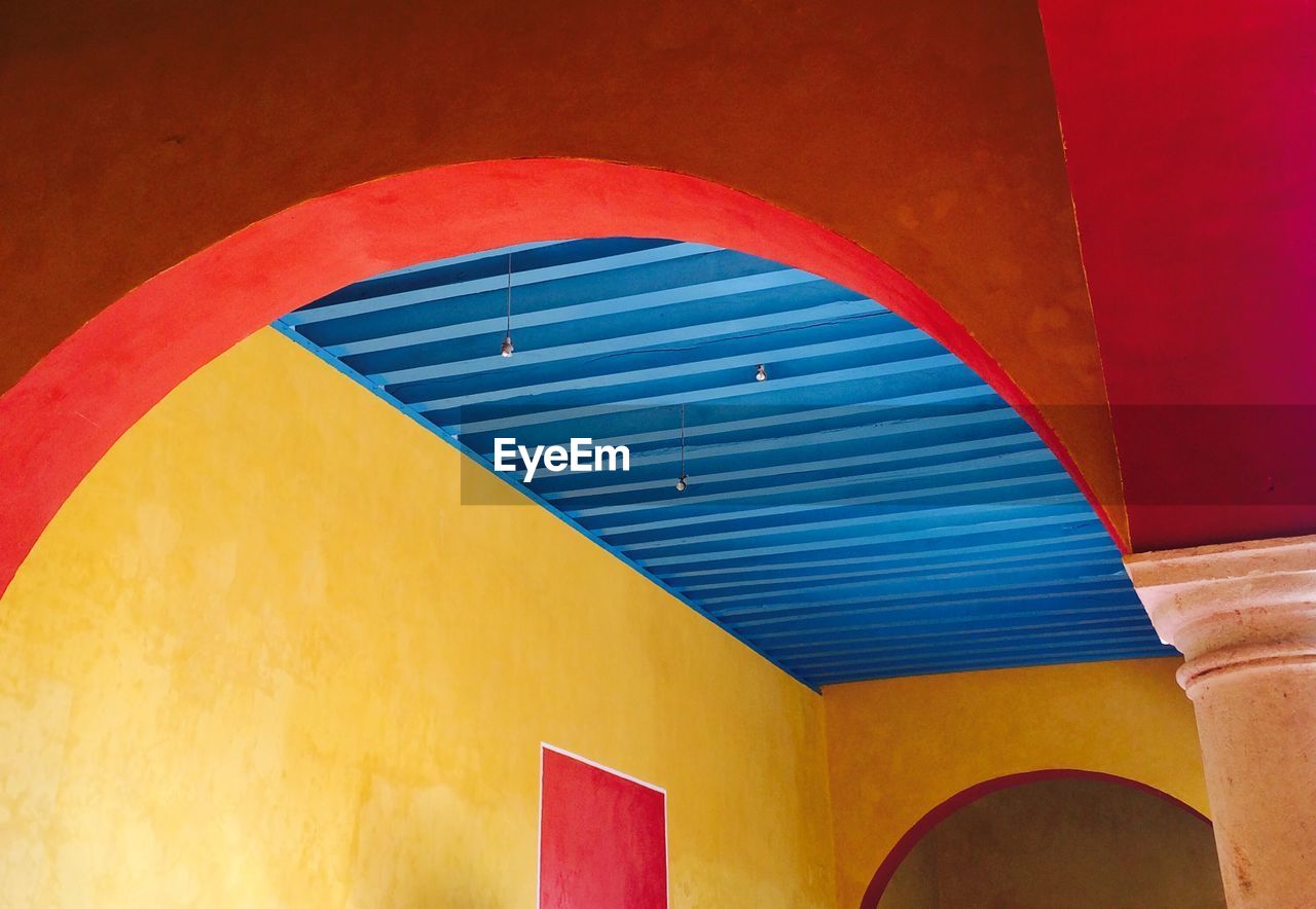 Low angle view of blue ceiling in building