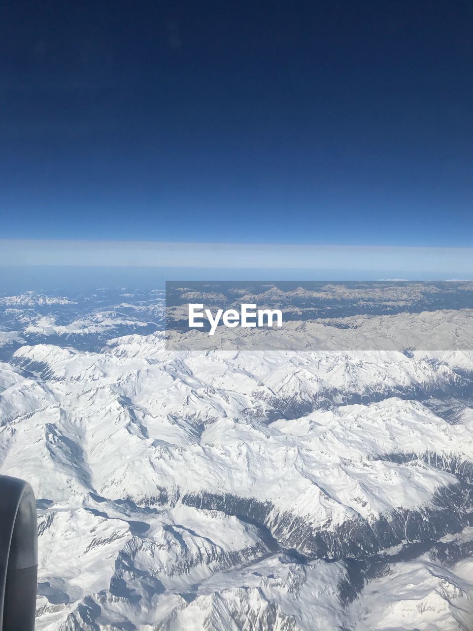 SCENIC VIEW OF MOUNTAINS AGAINST BLUE SKY