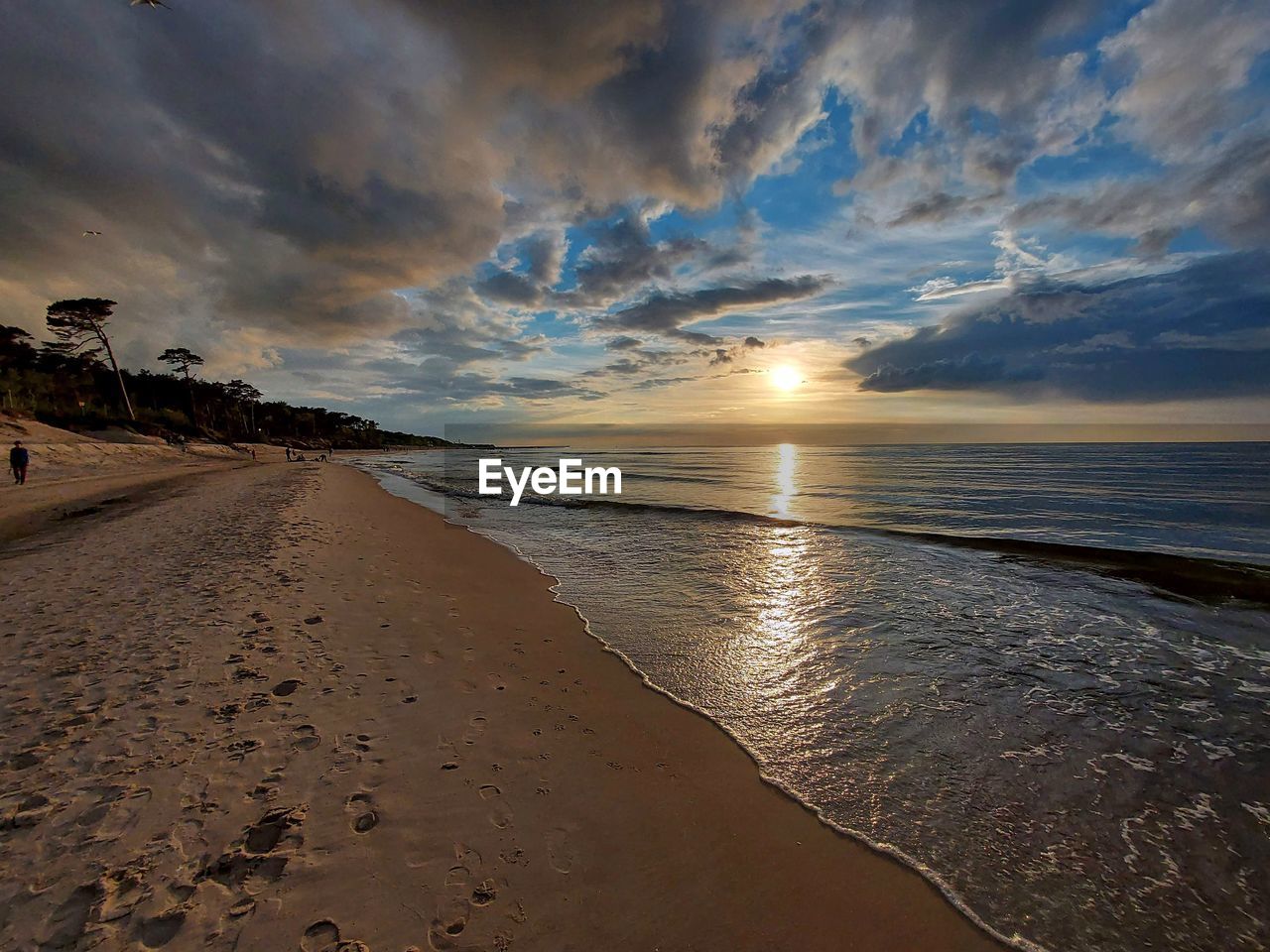 Scenic view of beach during sunset