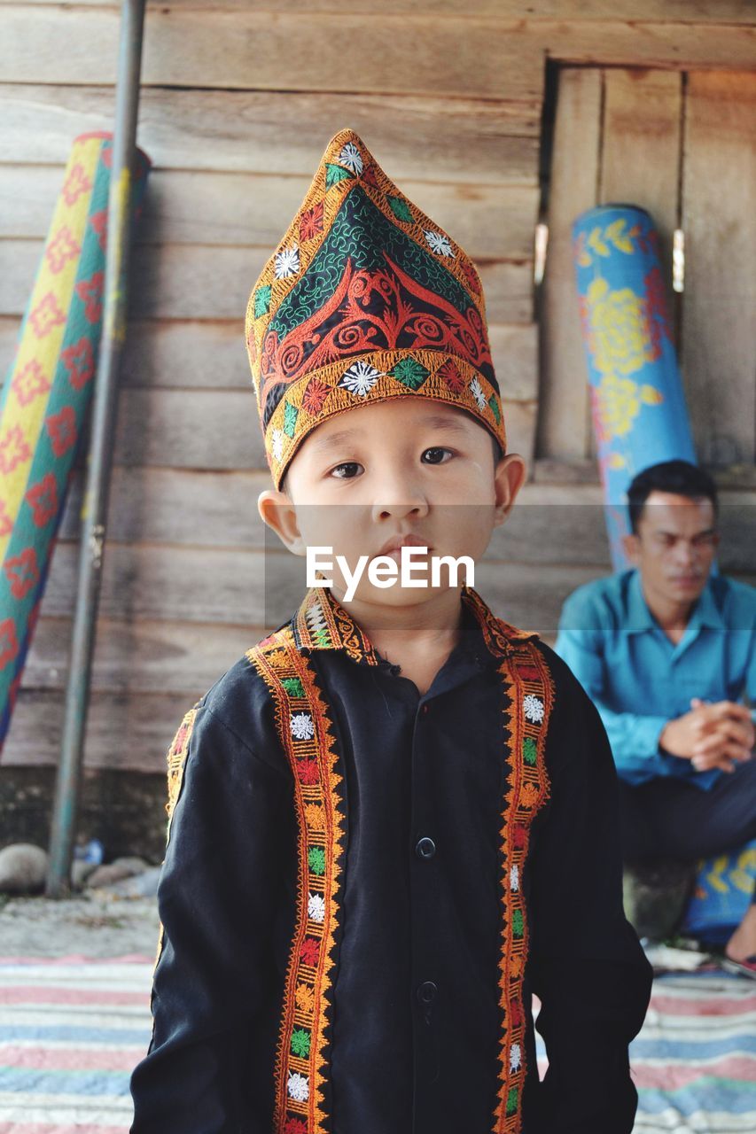 Little young man wearing clothes from the southeast aceh region