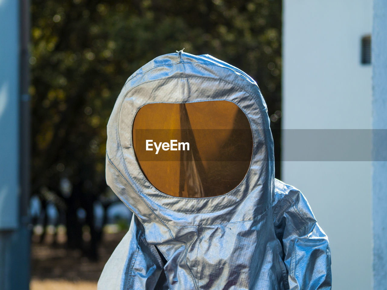 Person in protective workwear standing outdoors