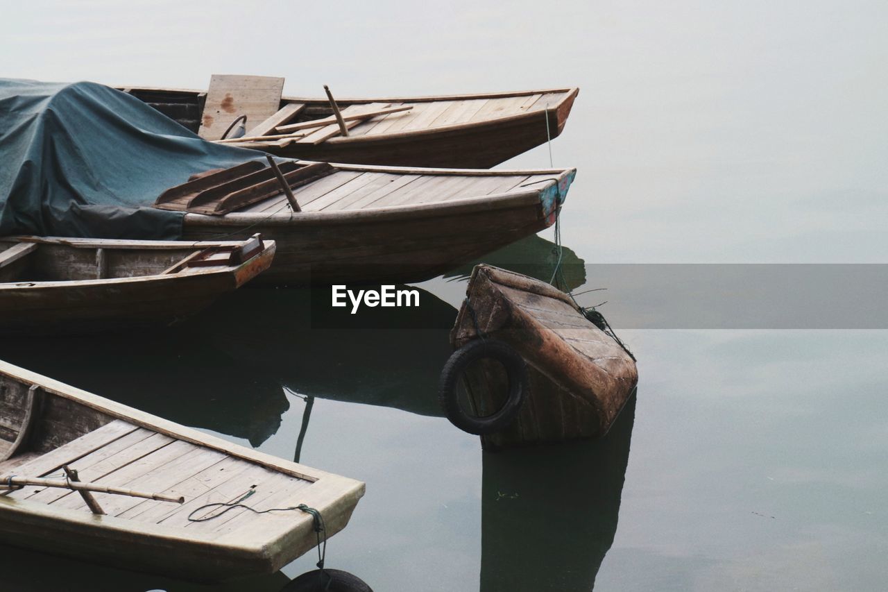 Boats moored on sea