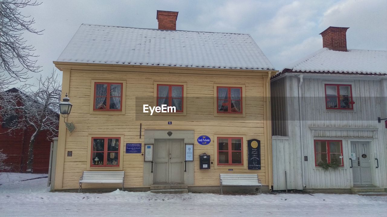 SNOW COVERED HOUSES IN WINTER