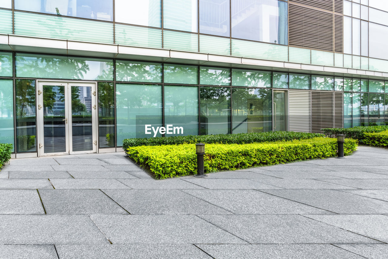 Modern building entrance,blue toned image.