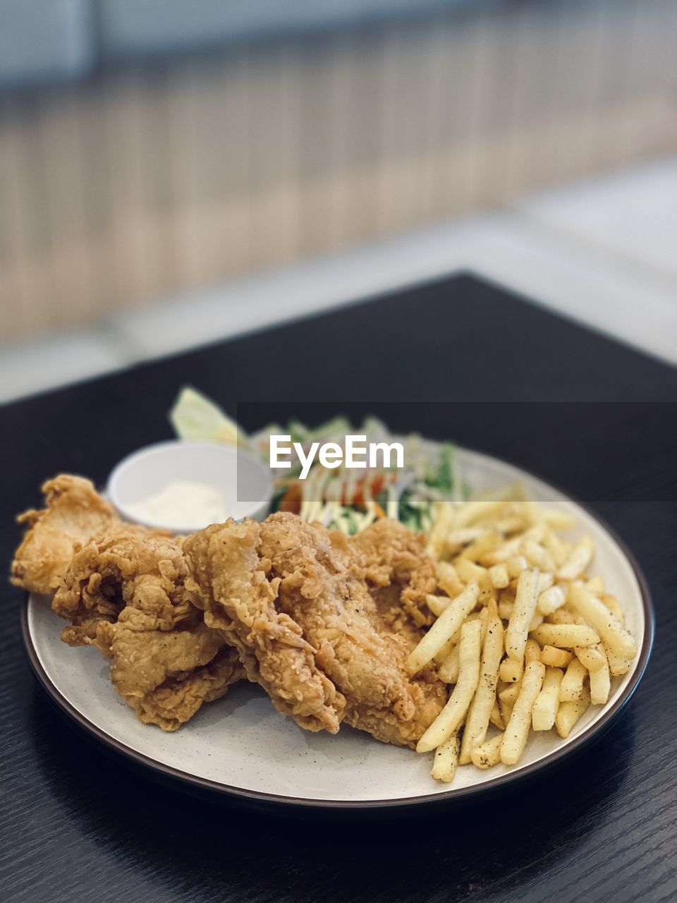 CLOSE-UP OF FOOD SERVED ON TABLE