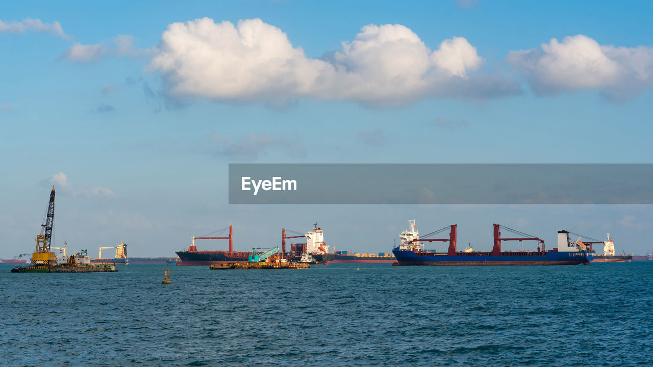 Logistic container ship at shipping yard at singapore harbour