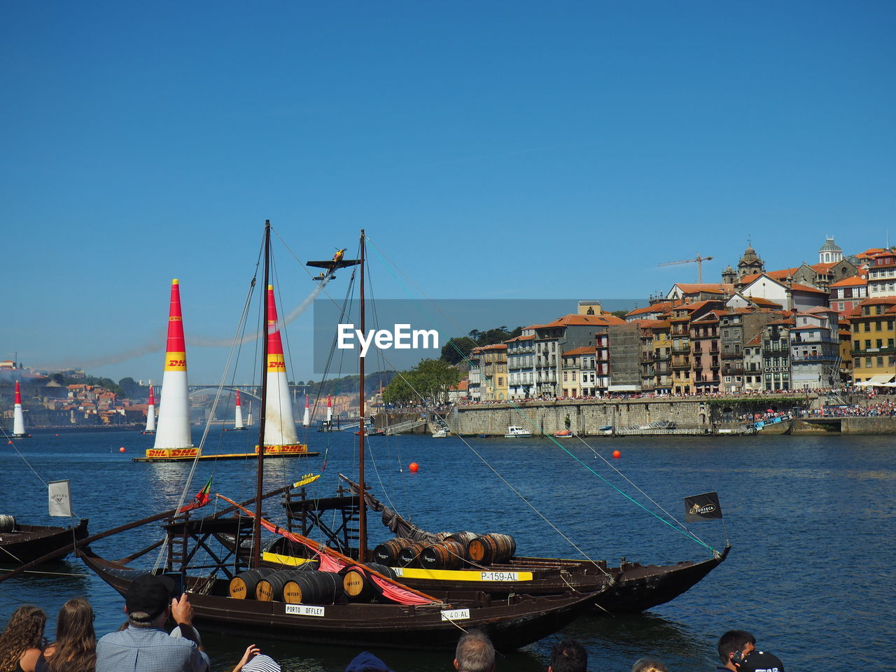 BOATS MOORED IN HARBOR