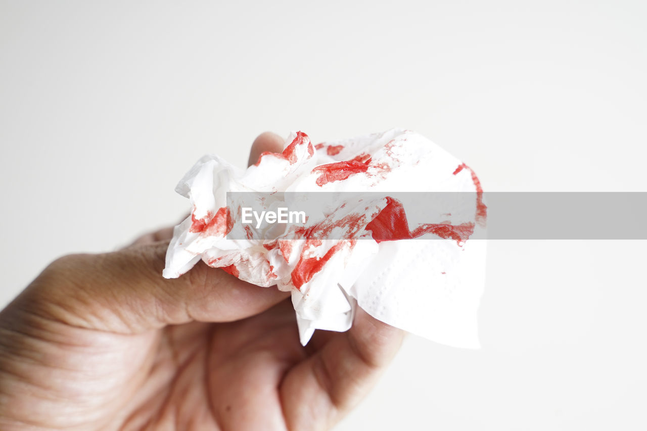 MIDSECTION OF PERSON HOLDING BOUQUET