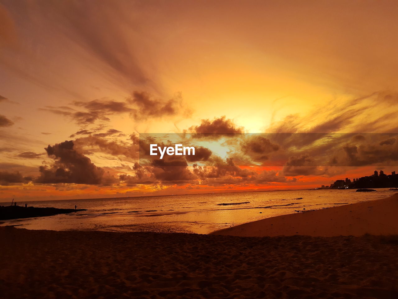 scenic view of beach during sunset