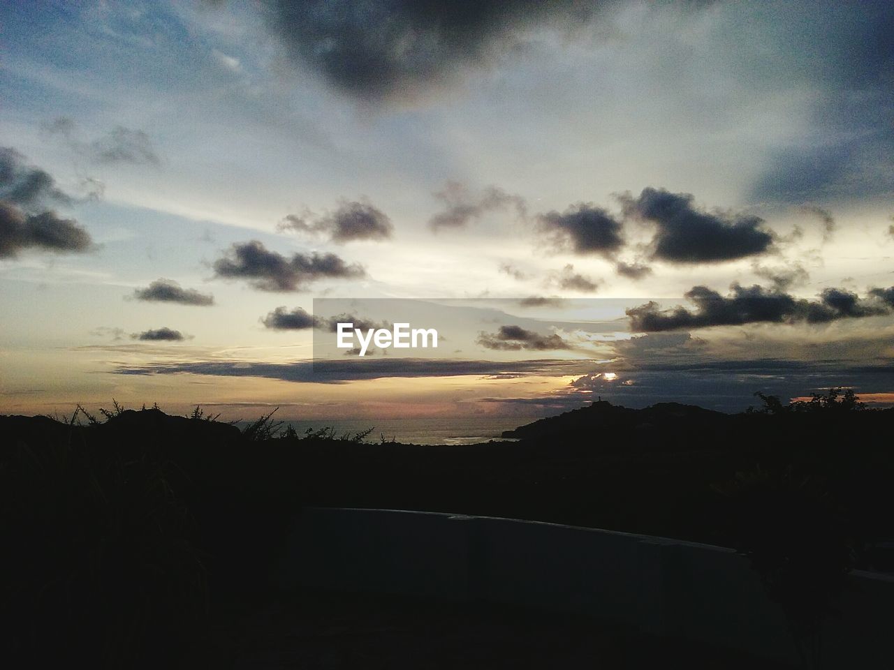 SILHOUETTE LANDSCAPE AGAINST SKY DURING SUNSET