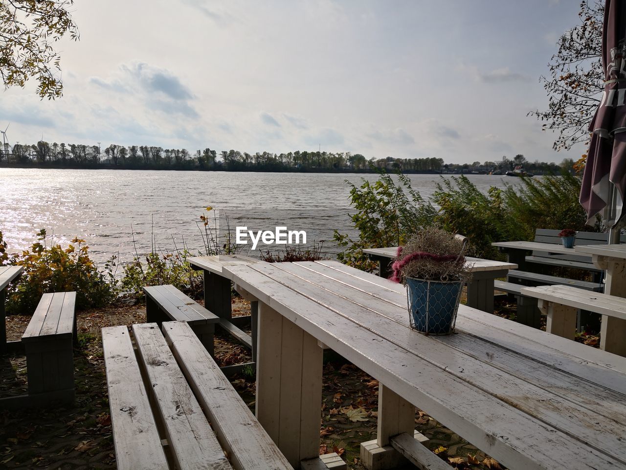 SCENIC VIEW OF LAKE BY PIER AGAINST SKY