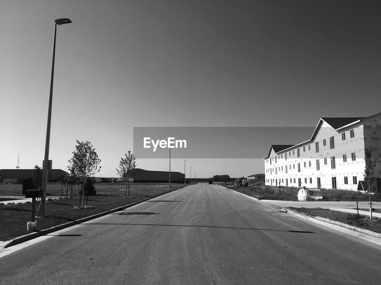 VIEW OF ROAD ALONG BUILDINGS