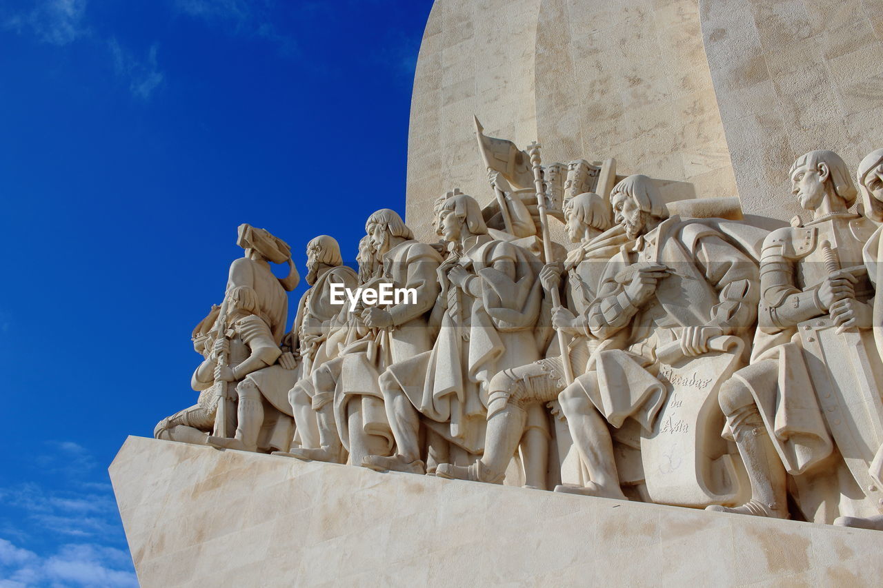 Low angle view of statue against sky