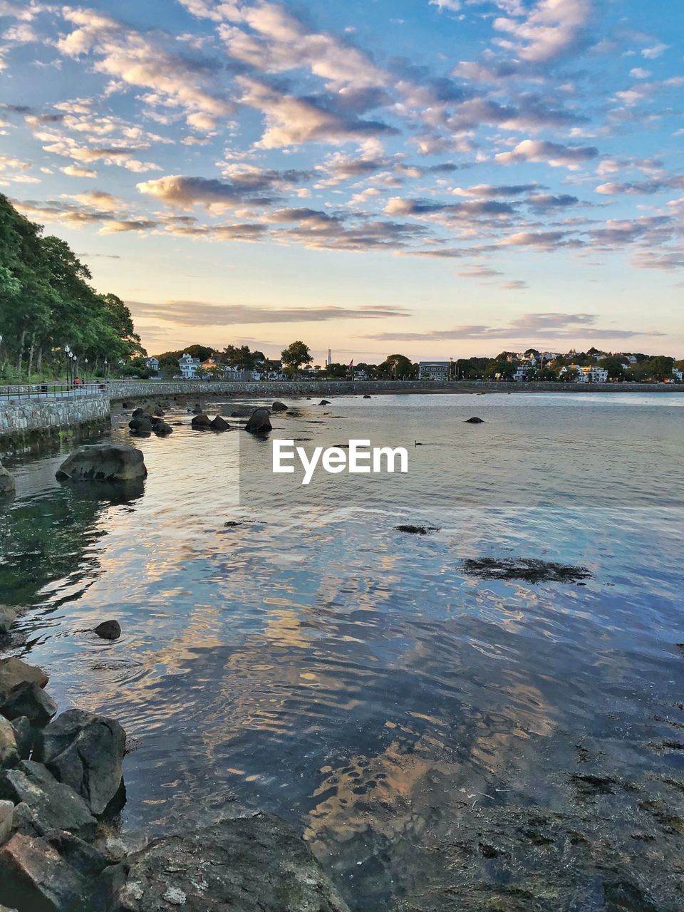 SCENIC VIEW OF ROCKS IN SEA AGAINST SKY