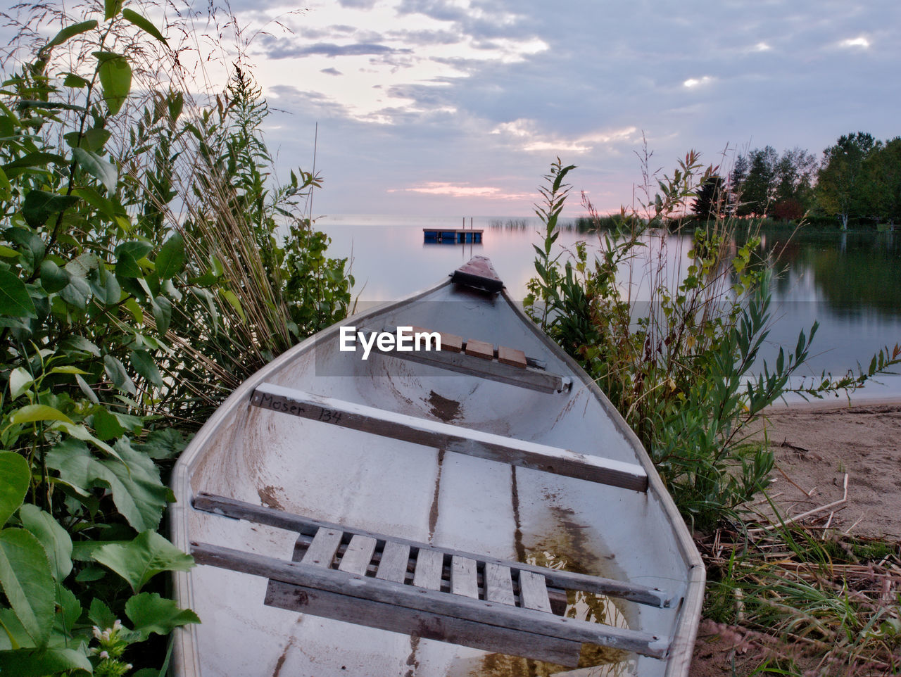 BUILT STRUCTURE BY PLANTS AGAINST LAKE