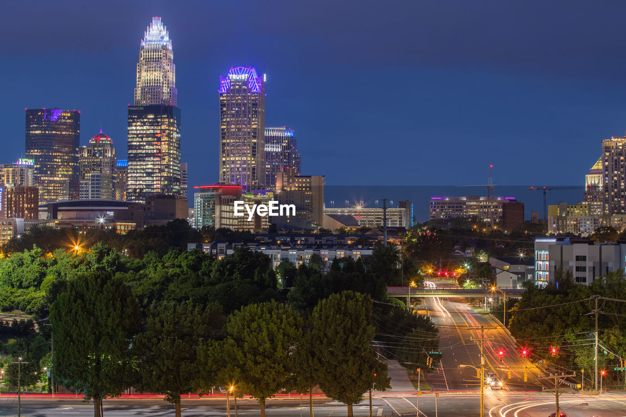 Illuminated buildings in city at night, downtown charlotte north carolina 