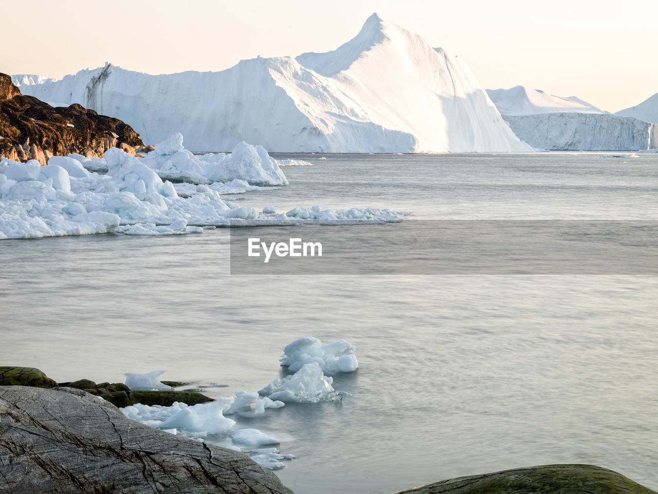 Scenic view of glacier against sky