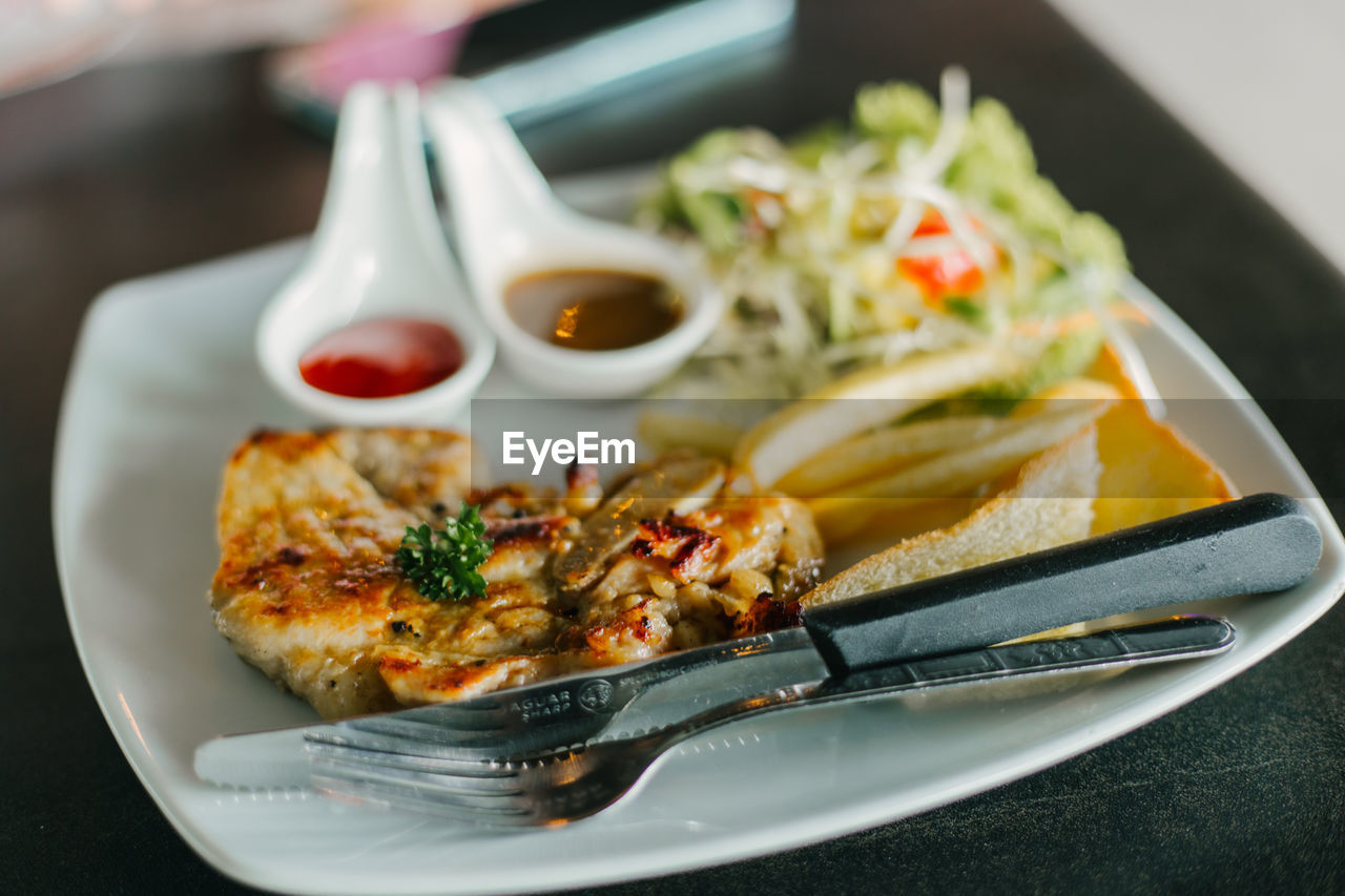 Close-up of food in plate on table