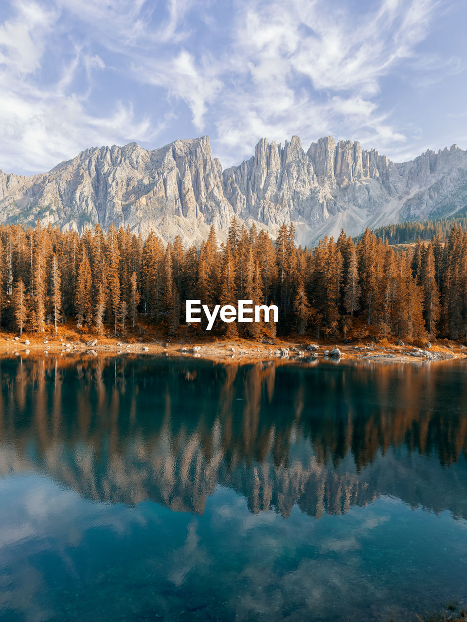 scenic view of lake and snowcapped mountains against sky